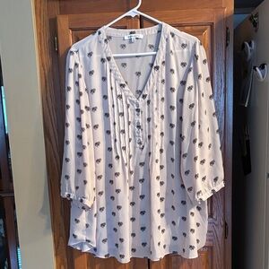 Chic Cream Blouse with Black Floral Design